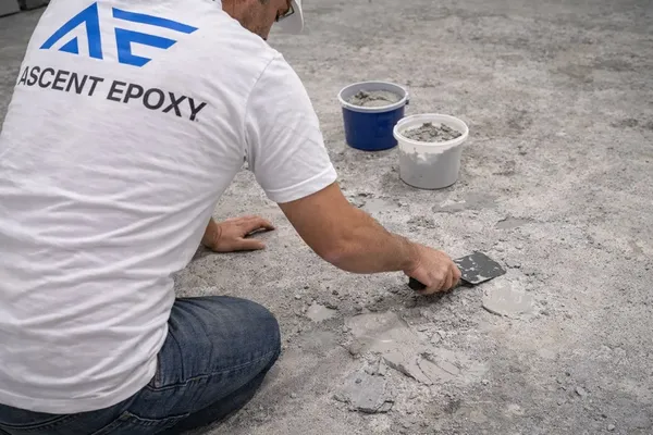 Grinding and preparing concrete after coating removal in San Antonio