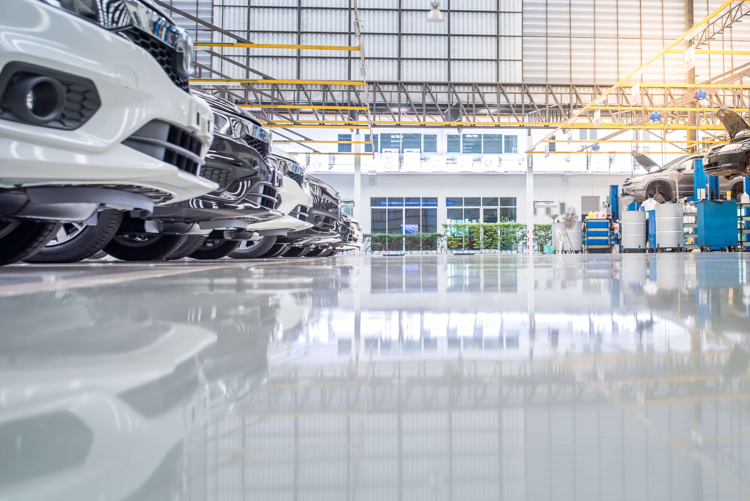 epoxy+car+dealership+(1) why choose epoxy flooring for your industrial facility?, epoxycardealership1